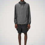 Chaqueta RAINS Impermeable Storm Breaker Grey - ECRU